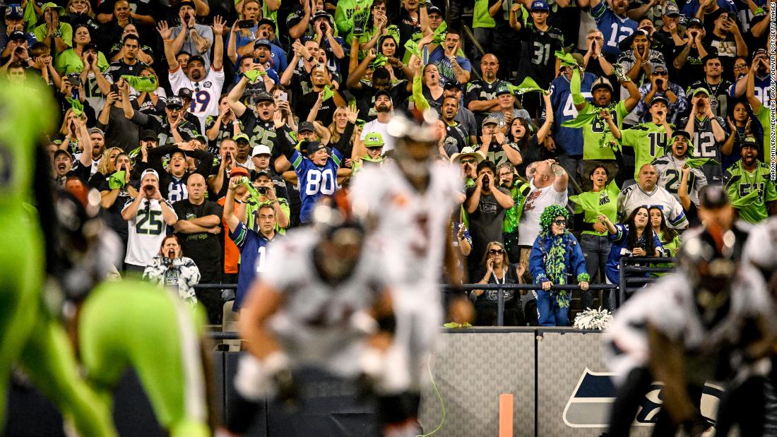 Football fans in Seattle make noise as Denver quarterback Russell Wilson prepares to take a snap during an NFL game on Monday, September 12. It was Wilson's first game back in Seattle since he was traded to Denver in the offseason. Wilson played 10 seasons in Seattle, winning a Super Bowl in 2014.