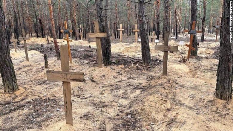 At least 440 unmarked graves found in recently liberated Ukrainian town