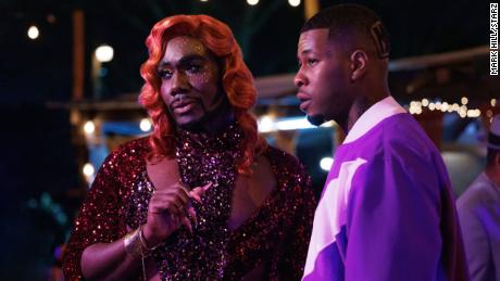 Nicco Annan, left, plays Uncle Clifford, the gender non-conforming strip club owner, in 