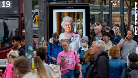 A picture of the Queen hangs on a bus stop in Edinburgh.