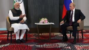 Russian President Vladimir Putin meets with India&#39;s Prime Minister Narendra Modi on the sidelines of the Shanghai Cooperation Organisation (SCO) leaders&#39; summit in Samarkand on September 16, 2022. (Photo by Sergei BOBYLYOV / SPUTNIK / AFP) (Photo by SERGEI BOBYLYOV/SPUTNIK/AFP via Getty Images)