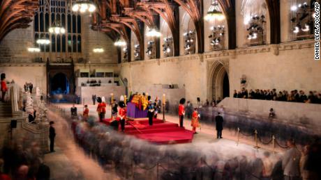 The Queen's children hold a silent vigil for their matriarch in Westminster Hall on Friday.