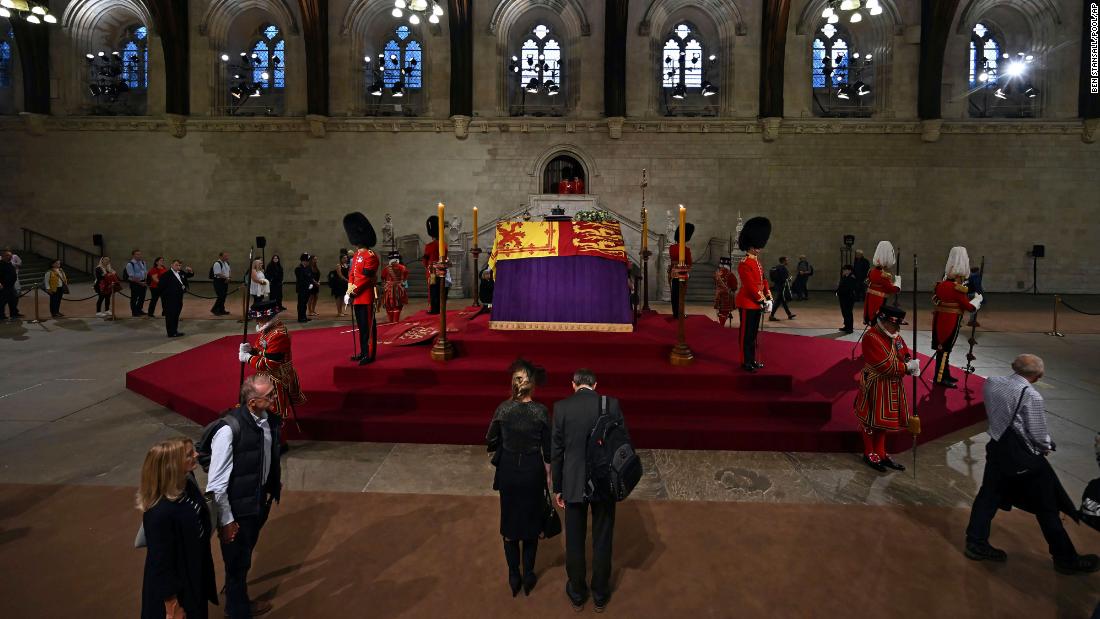 Members of the public view the Queen&#39;s coffin on Thursday.