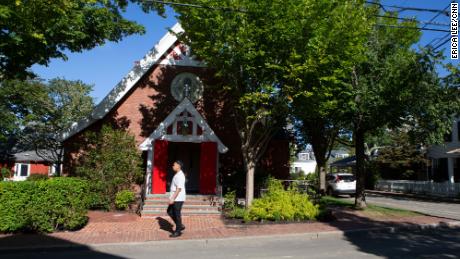 A man walks past St. Andrew&#39;s Episcopal Church in Edgartown, Martha&#39;s Vineyard, on Saturday, September 17. 