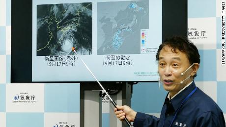 A director of the Japan Meteorological Agency&#39;s Forecast Division during a news conference on Typhoon Nanmadol in Tokyo on September 17, 2022.