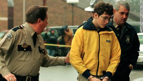 Authorities escort Michael Carneal to his arraignment in January 1998. 