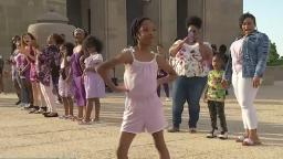 Black women and girls celebrate their natural hair with annual photoshoot at Liberty Memorial