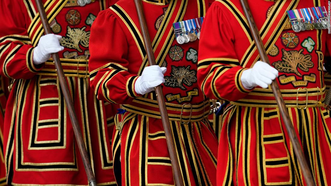 Yeoman of the Guard arrive before the Queen&#39;s coffin was carried into Westminster Abbey.