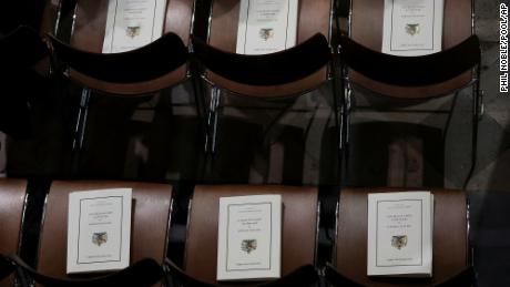 Funeral programs placed on chairs in Westminster Abbey.