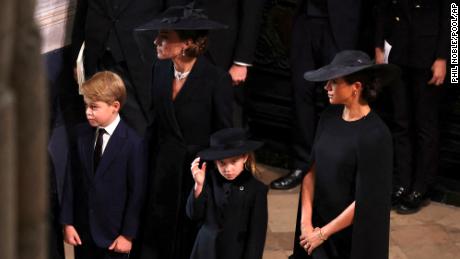 Catherine, Princess of Wales, Meghan, Duchess of Sussex, Prince George and Princess Charlotte arrive at  Westminster Abbey for the state funeral of Queen Elizabeth II on Monday, September 19, 2022.  