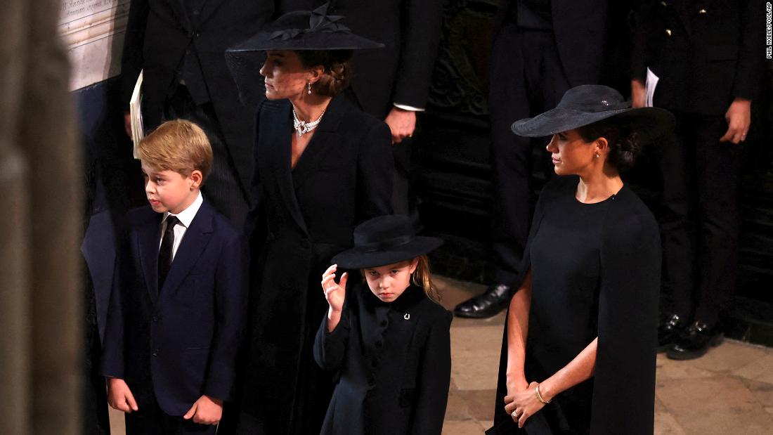 From left, Catherine, the Princess of Wales, and Meghan, the Duchess of Sussex, arrive at Westminster Abbey with Catherine&#39;s children Prince George and Princess Charlotte.