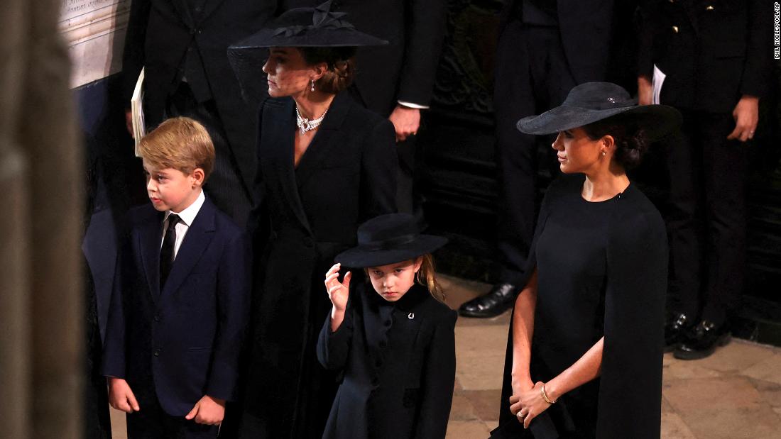 Prince George and Princess Charlotte walk in Queen's funeral procession