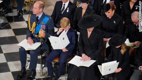 From left, Prince William, Prince George, Catherine, the Princess of Wales and Princess Charlotte at the Queen's funeral.