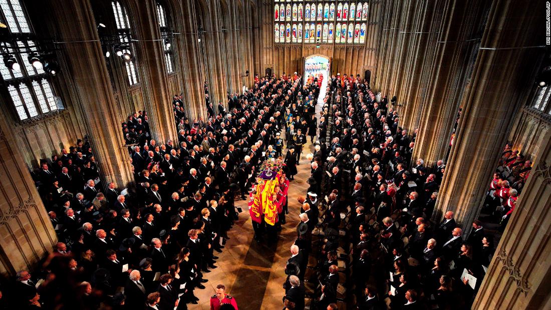Members of the royal family follow the coffin into St. George&#39;s Chapel.