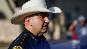 Bexar County Sheriff Javier Salazar briefs the news media at the scene where an 18-wheeler was searched on the 2000 block of South General McMullen in San Antonio, Friday, July 1, 2022. A deputy constable was flagged down on Friday afternoon by a concerned citizen, who saw people getting out of a semi-truck near an apartment complex and was worried about a &quot;possible smuggling incident,&quot; Salazar said. Officials on the scene concluded that it was a misunderstanding and the 14 people jumping out of the truck were part of a work crew for a demolition cleanup company based in California.