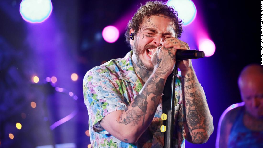 Video: Post Malone falls through hole on stage during performance – CNN Video