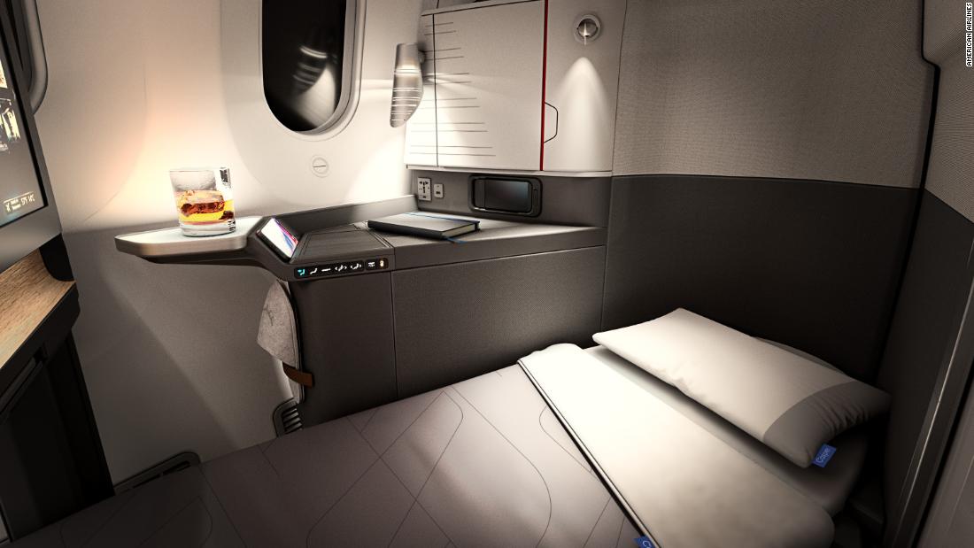 Read more about the article American Airlines to introduce premium suites with privacy doors – CNN