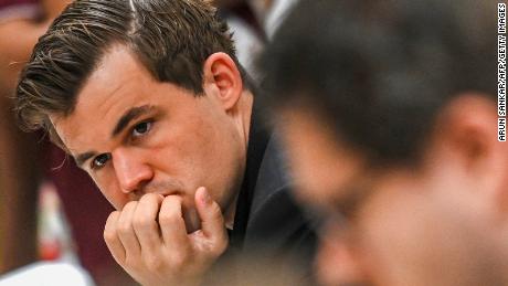 Magnus Carlsen quits match without explanation amid apparent feud with fellow grandmaster Hans Niemann