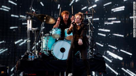 (From left) Ashton Irwin and Luke Hemmings of 5 Seconds of Summer perform at the 2022 iHeartRadio Wango Tango at Dignity Health Sports Park on June 4 in Carson, California. 