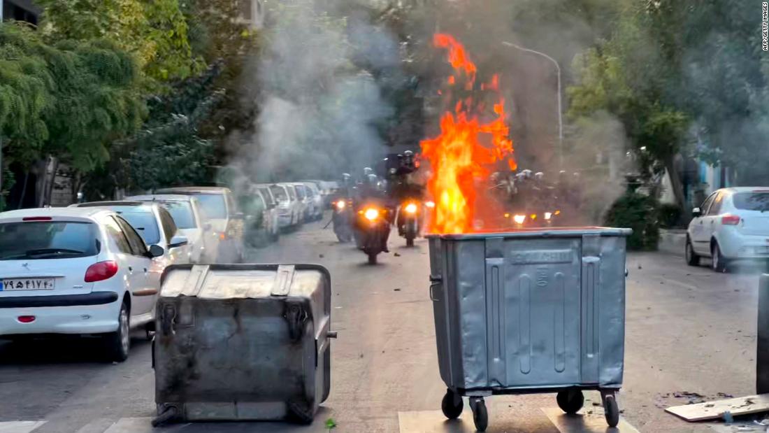 Iranian women burn their hijabs as hundreds protest death of Mahsa Amini