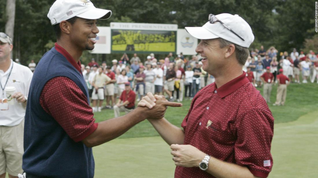 Woods (L) and David Toms (R) celebrate another US triumph following a 18.5 - 15.5 victory at Robert Trent Jones Golf Club in 2005. Chris DiMarco fittingly clinched victory for the Americans having secured a team-best 4.5 points.