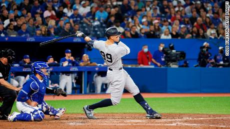Aaron Judge hits an RBI double against the Toronto Blue Jays at Rogers Centre on May 3 in Canada.
