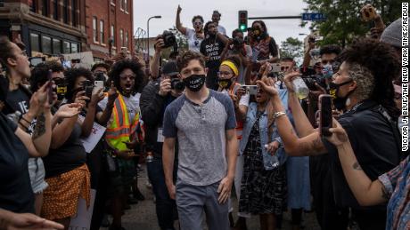 Minneapolis Mayor Jacob Frey is shouted at by protesters at a Defund the Police march in early June of 2020 to protest the police killing of George Floyd. (Victor J. Blue/The New York Times/Redux)