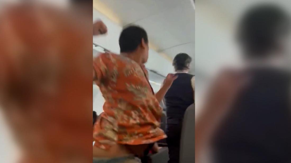 Video: Passenger strikes flight attendant mid-flight