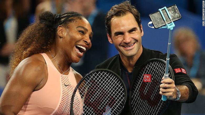 Federer and Williams take a selfie after competing together in mixed doubles in 2019.