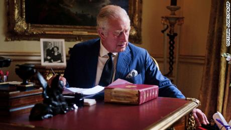 A new portrait of King Charles III shows him on official government duties from his Red Box at Buckingham Palace, London.