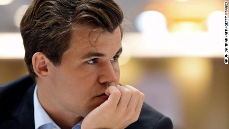 FIDE reprimands Magnus Carlsen for quitting match after one move but &#39;shares his deep concerns&#39; about cheating in chess