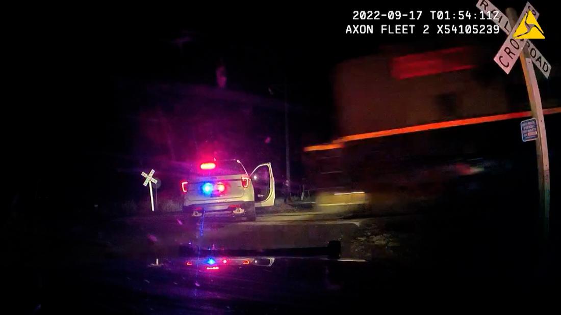 Video shows train hit police car with suspect inside