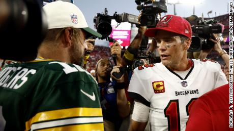 Rodgers (left) and Brady greet each other after Sunday&#39;s game. 