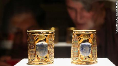 Visitors look at artefacts displayed at the Egyptian Museum as Egypt&#39;s Ministry of Tourism and Antiquities celebrates World Tourism Day, in Cairo, on Tuesday. 