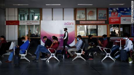 Passengers in a departure lounge after Adani Group took over operations at Sardar Vallabhbhai Patel International Airport in Ahmedabad, India, in November 2020. 