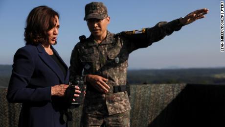 U.S. Vice President Kamala Harris holds binoculars at the military observation post as she visits the demilitarized zone (DMZ) separating the two Koreas, in Panmunjom, South Korea, September 29, 2022. REUTERS/Leah Millis/Pool