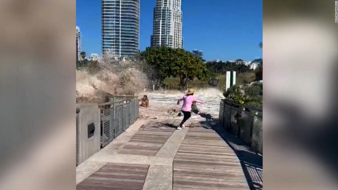 Watch: Massive wave sweeps people off boardwalk – CNN Video