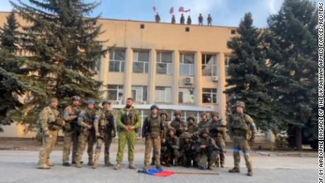 Ukrainian armed forces make a statement in front of Lyman Town Administration office, in Lyman, Ukraine, in this still image taken from a social media video, released on October 1.