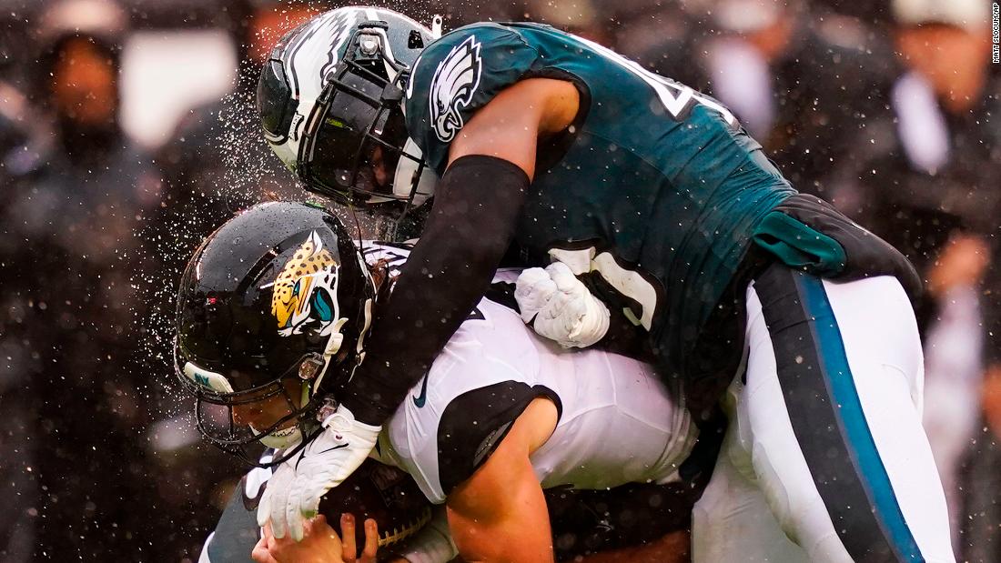 Jacksonville Jaguars quarterback Trevor Lawrence is brought down by Philadelphia Eagles linebacker Kyzir White in the second half of the Eagles&#39; 29-21 win in Philly. The Eagles are now 4-0 after Week 4.