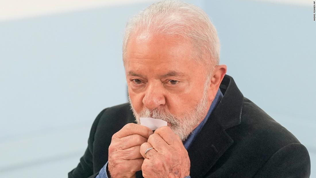 Lula kisses his ticket after voting in general elections in São Paulo on October 2.