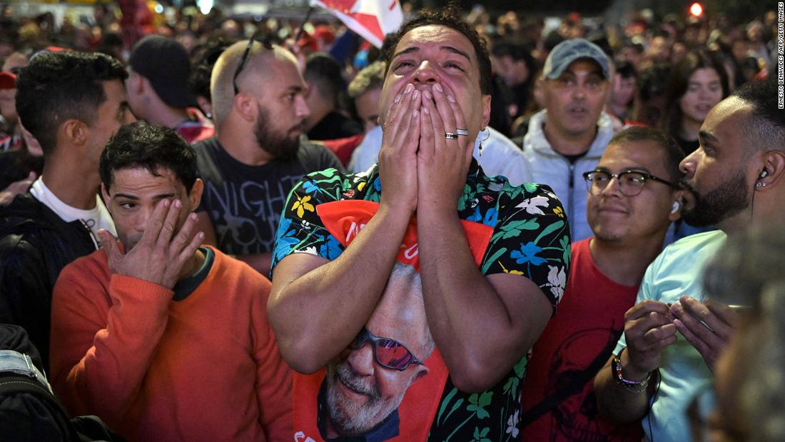 Lula supporters react as they watch the vote count of in São Paulo on October 2. Neither candidate got 50% of the vote and it went to a run-off.&lt;br /&gt;