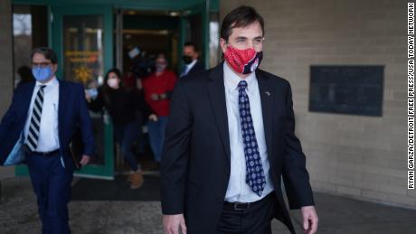 Former state health director Nick Lyon exits after making an appearance on a video arraignment at the Genesee County Jail in Flint, Michigan, on January 14, 2021.