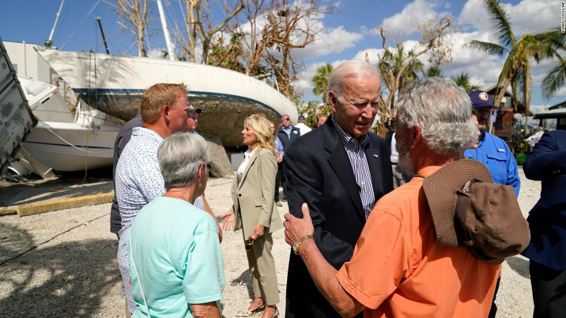 President Joe Biden and first lady Jill Biden talk to people impacted by Hurricane Ian in Fort Myers, Florida, during a tour of the area on Wednesday, October 5.
