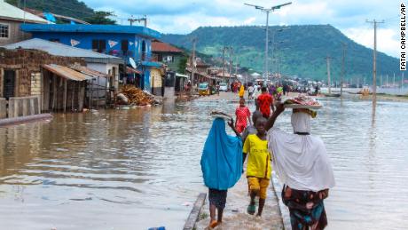 Floods are submerging whole houses in Nigeria. At least 80 have died trying to escape