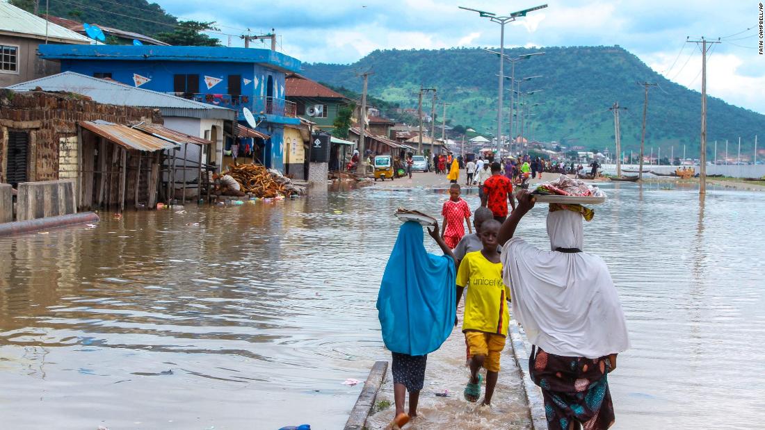 Floods are submerging whole houses in Nigeria. At least 80 have died trying to escape