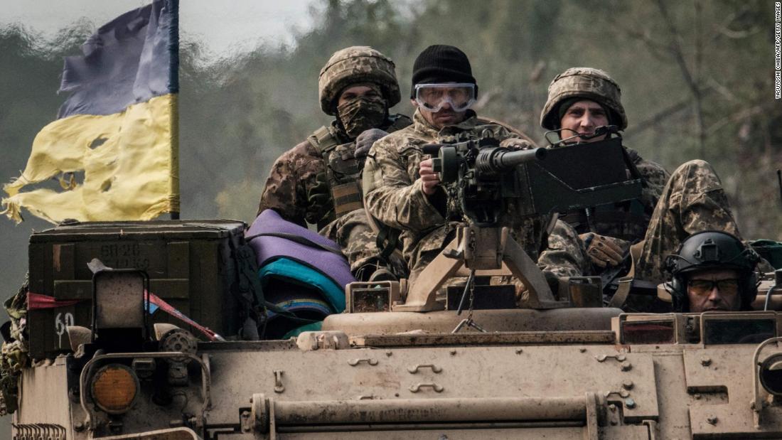 Ukrainian soldiers ride on an armored vehicle near the recently retaken town of Lyman in Donetsk region on October 6, as the &lt;a href=&quot;https://edition.cnn.com/2022/10/04/europe/russia-ukraine-annexation-intl/index.html&quot; target=&quot;_blank&quot;&gt;Ukrainian military continues to advance&lt;/a&gt; into several of the areas Russia now claims as its own.