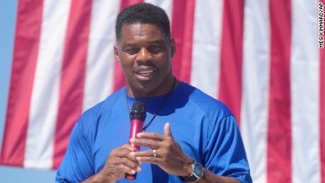 Georgia GOP Senate nominee Herschel Walker smiles during remarks during a campaign stop at Battle Lumber Co. on Thursday, Oct. 6, 2022, in Wadley, Ga. Walker&#39;s appearance was his first following reports that a woman who said Walker paid for her 2009 abortion is actually mother of one of his children - undercutting Walker&#39;s claims he didn&#39;t know who she was .(AP Photo/Meg Kinnard)