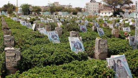 Yemen locals visit a cemetery with the graves of Yemenis who have lost their lives during the war, amongst them soldiers, on October 7 in Sanaa, Yemen.  
