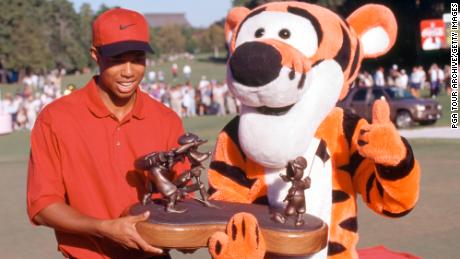 Woods celebrates victory at the 1996 Walt Disney World Golf Classic.