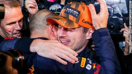 Max Verstappen celebrates becoming F1 world champion with his race engineer, Gianpiero Lambiase.